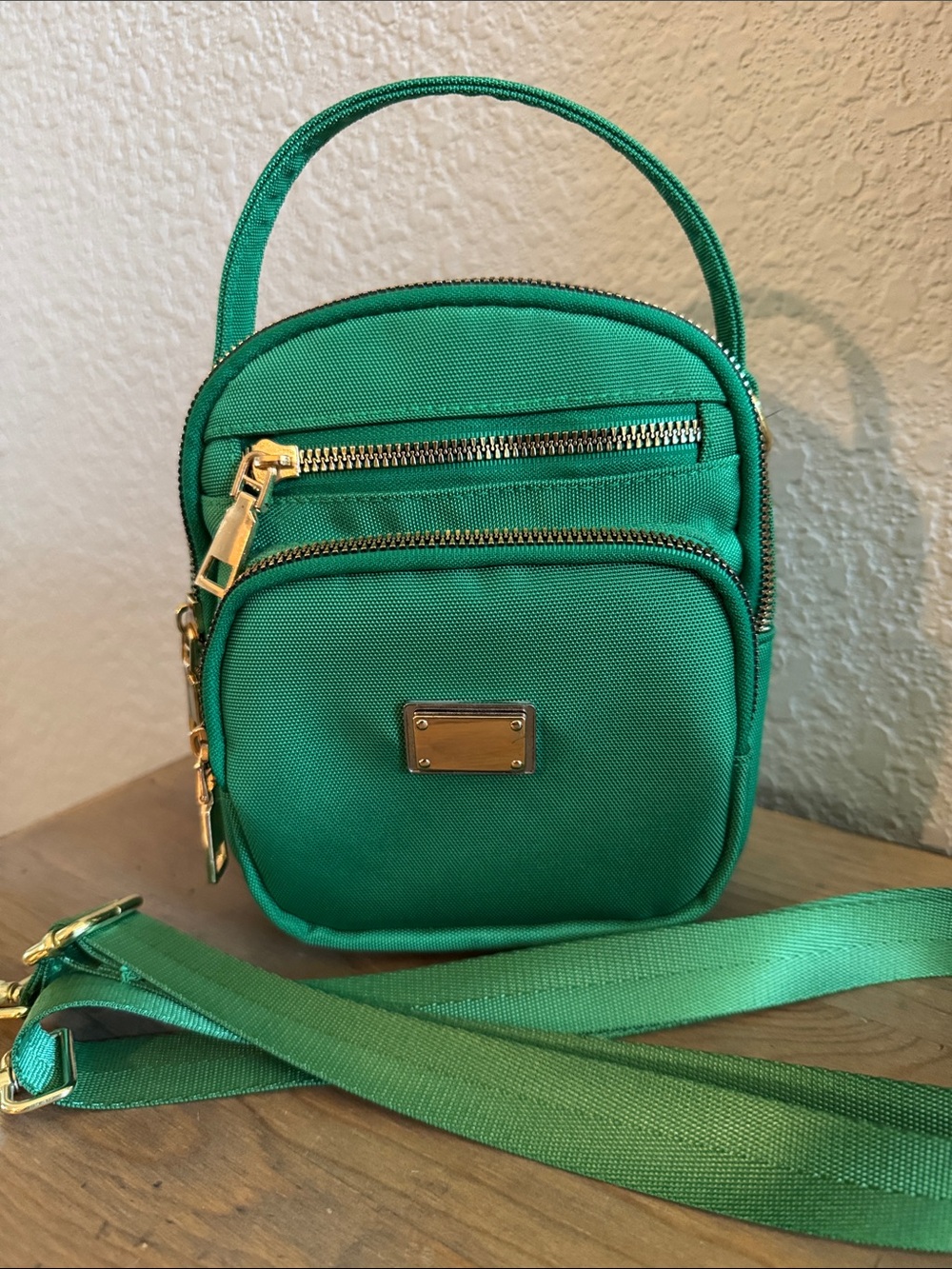 Green Nylon Multiple Compartment Crossbody bag.